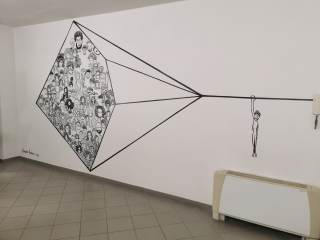 aquilone disegnato su un muro